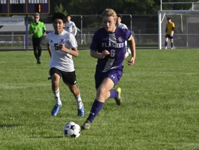Champion scores flurry of goals in 2nd half to down Campbell